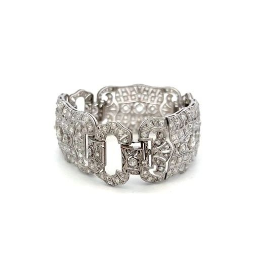 PLATINUM ART-DECO BRACELET WITH 8.31 CARAT OLD EUROPEAN CUT DIAMONDS J-SI: PLATINUM ART-DECO BRACELET WITH 8.31 CARAT OLD EUROPEAN CUT DIAMONDS J-SI Detailed Description: This vintage Art-Deco platinum Link Bracelet is a stunning masterpiece featuring a luxurious array of di