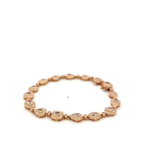 VINTAGE 18K ROSE GOLD LINK BRACELET WITH 2.65 CARAT PINK WHITE ROUND DIAMONDS: VINTAGE 18K ROSE GOLD LINK BRACELET WITH 2.65 CARAT PINK WHITE ROUND DIAMONDS Detailed Description: Embrace the timeless elegance of this vintage 18K Rose Gold bracelet. Adorned with 16 round brillian