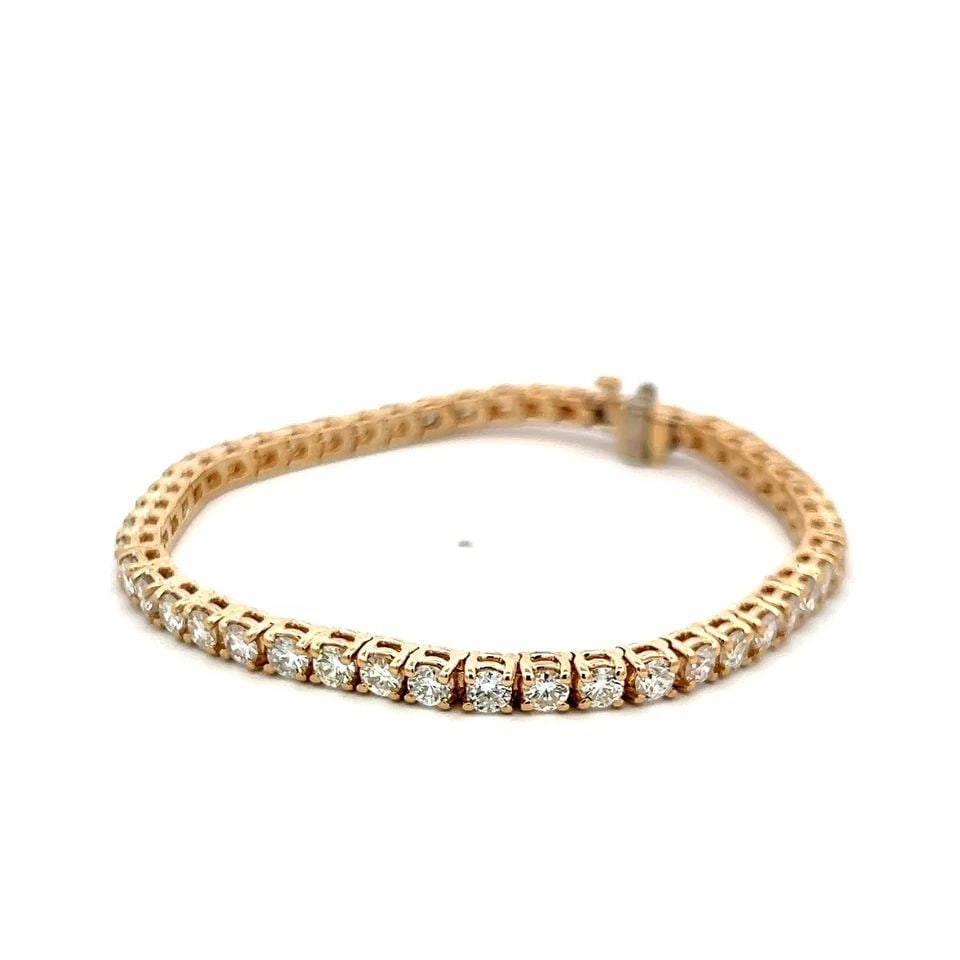 6.35 CARAT G VS ROUND BRILLIANT DIAMOND 14K WHITE GOLD TENNIS BRACELET: 6.35 CARAT G VS ROUND BRILLIANT DIAMOND 14K WHITE GOLD TENNIS BRACELET PRODUCT DESCRIPTION Title: This exquisite 6.35-carat diamond tennis bracelet showcases 47 perfectly matched round brilliant-cut d