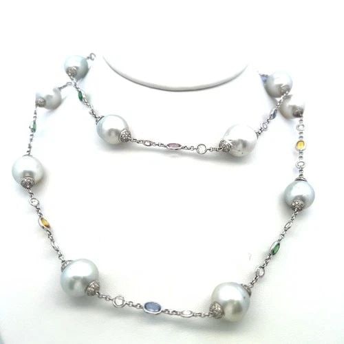 PEARL, ROSE-CUT DIAMOND & MULTI-GEM STATION NECKLACE IN 18K WHITE GOLD (32.5"): PEARL, ROSE-CUT DIAMOND & MULTI-GEM STATION NECKLACE IN 18K WHITE GOLD (32.5") PRODUCT DESCRIPTION Title: This luxurious 32.5-inch station necklace features an elegant combination of 12.5–14.5 mm pe