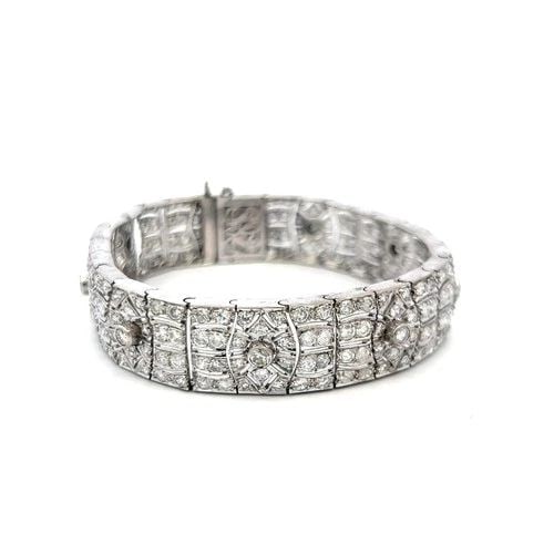 7.00 CARAT DIAMOND ART DECO BRACELET 14K WHITE GOLD VINTAGE ESTATE JEWELRY: 7.00 CARAT DIAMOND ART DECO BRACELET 14K WHITE GOLD VINTAGE ESTATE JEWELRY Title: This striking vintage Art Deco bracelet is finely crafted in solid 14 karat white gold and showcases an impressive dis