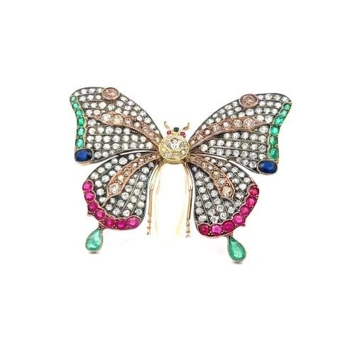 18K TRI COLOR GOLD BUTTERFLY PIN BROOCH WITH MULTI-STONE DESIGN 9+ CARAT DIAMOND: 18K TRI COLOR GOLD BUTTERFLY PIN BROOCH WITH MULTI-STONE DESIGN 9+ CARAT DIAMOND Video: Video Link Detailed Description: This vibrant butterfly pin radiates urban sophistication with its dynamic mix o