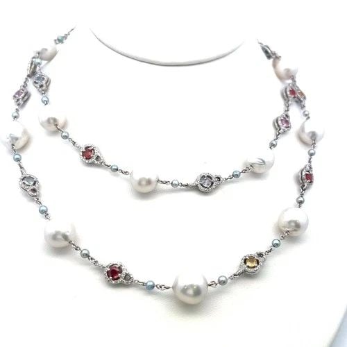 MULTI-GEM PEARL STATION NECKLACE IN 18K WHITE GOLD WITH DIAMOND ACCENTS 1.56CT: MULTI-GEM PEARL STATION NECKLACE IN 18K WHITE GOLD WITH DIAMOND ACCENTS 1.56CT MULTI-GEM PEARL STATION NECKLACE IN 18K WHITE GOLD WITH DIAMOND ACCENTS 1.56CT $13,120.00 PRODUCT DESCRIPTION Title: This