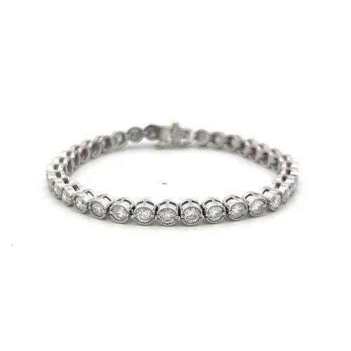 7.00 CARAT ROUND BRILLIANT DIAMOND 14K WHITE GOLD TENNIS BRACELET: 7.00 CARAT ROUND BRILLIANT DIAMOND 14K WHITE GOLD TENNIS BRACELET Title: This classic diamond tennis bracelet is expertly crafted in 14 karat white gold and showcases a continuous row of 35 round bril