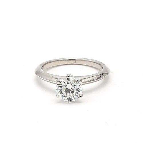 TIFFANY & CO. 1.30 CARAT ROUND BRILLIANT H VS2 DIAMOND PLATINUM ENGAGEMENT RING: TIFFANY & CO. 1.30 CARAT ROUND BRILLIANT H VS2 DIAMOND PLATINUM ENGAGEMENT RING Title: Tiffany & Co 1.30 Carat Round Brilliant H VS2 Diamond Platinum Engagement Ring Style: Engagement Metal: Platinum 