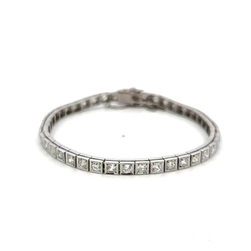 4.49 CARAT OLD EUROPEAN CUT AND BAGUETTE DIAMOND PLATINUM TENNIS BRACELET (1 of 2)
