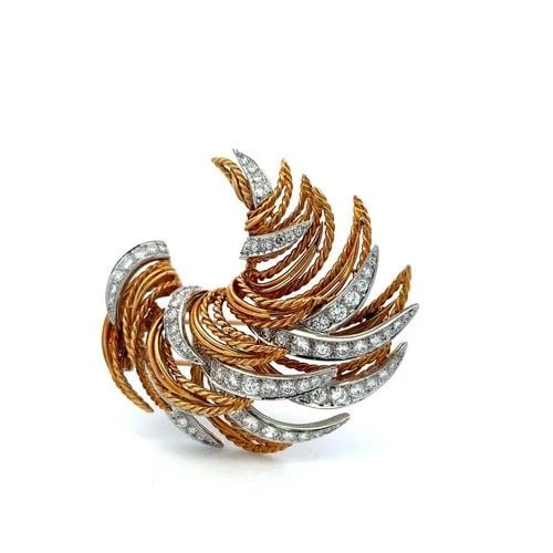 TWO TONE GOLD PLATINUM PIN BROOCH WITH 2.2 CARAT ROUND F VS DIAMONDS: TWO TONE GOLD PLATINUM PIN BROOCH WITH 2.2 CARAT ROUND F VS DIAMONDS Detailed Description: Embrace the timeless elegance of a bygone era with this vintage brooch, a testament to exquisite craftsmanshi