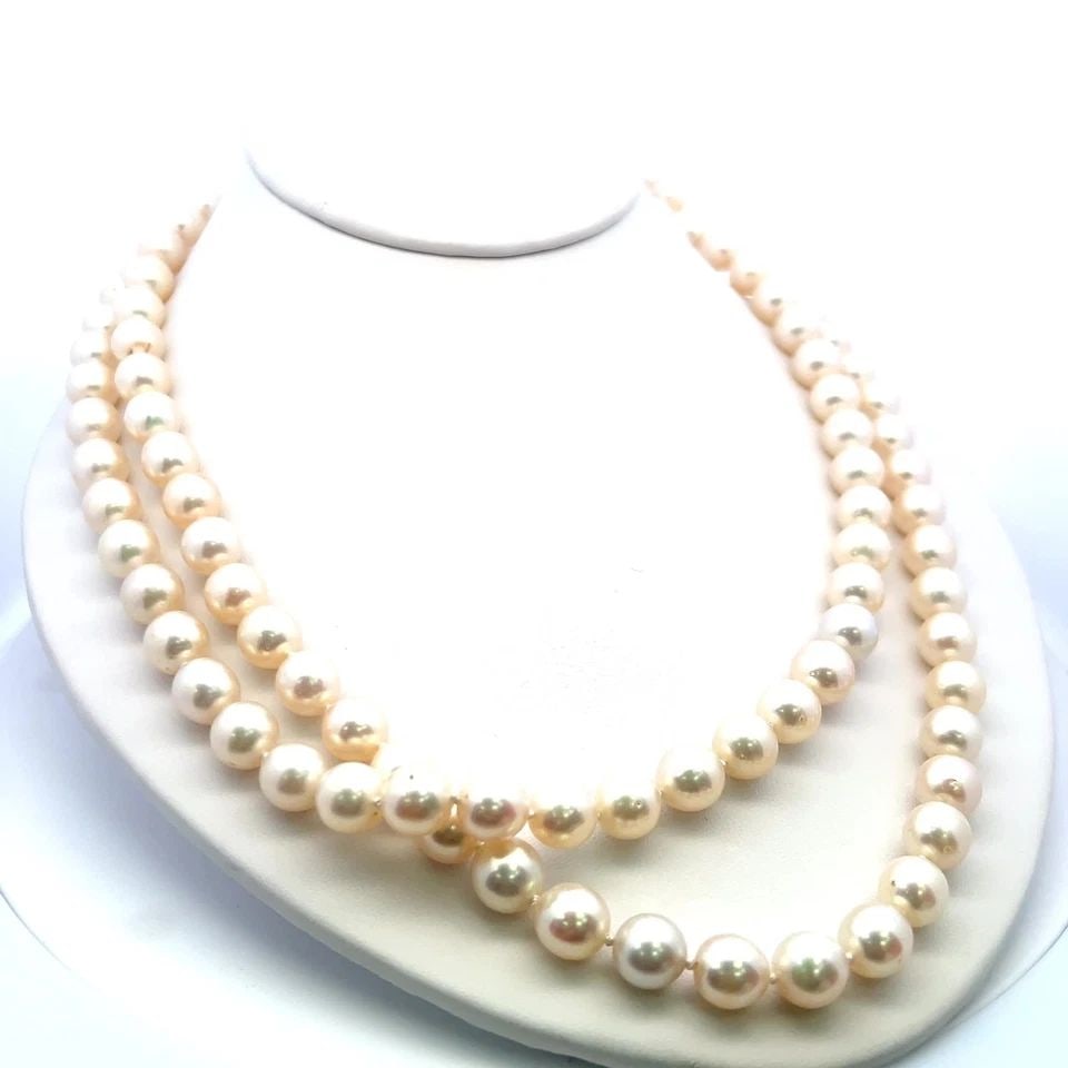 18K YG BEED NECKLACE WITH 1.1 CARAT ROUND DIAMOND, 8.75MM PEARL & 22X31 MM OPAL: 18K YG BEED NECKLACE WITH 1.1 CARAT ROUND DIAMOND, 8.75MM PEARL & 22X31 MM OPAL Detailed Description: Step into the spotlight with this stunning vintage necklace, crafted from luxurious 18K yellow gol