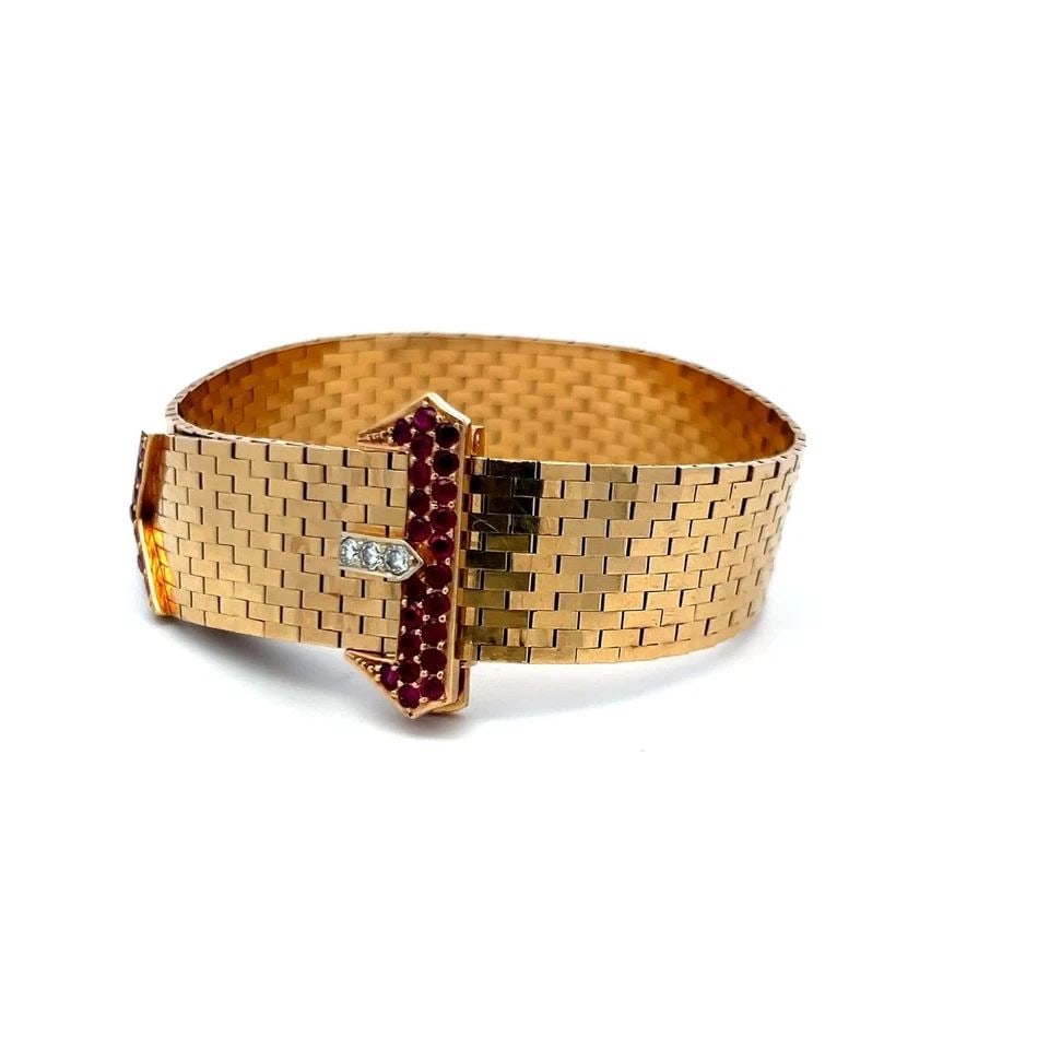 0.79CT RUBY & 0.09CT ROUND BRILLIANT DIAMOND RETRO BRACELET IN 14K YELLOW GOLD: 0.79CT RUBY & 0.09CT ROUND BRILLIANT DIAMOND RETRO BRACELET IN 14K YELLOW GOLD PRODUCT DESCRIPTION Title: 0.79 Carat Ruby 0.09 Carat Round Brilliant I SI Diamond 14 Karat Yellow Gold Retro Bracelet St