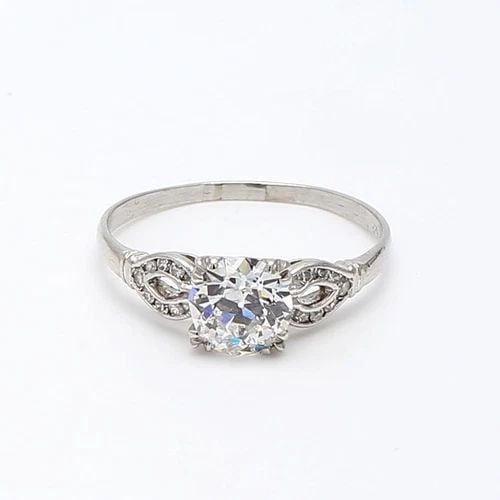 1.54 CARAT OLD EUROPEAN CUT J SI1 AND DIAMOND PLATINUM ENGAGEMENT RING: 1.54 CARAT OLD EUROPEAN CUT J SI1 AND DIAMOND PLATINUM ENGAGEMENT RING Title: 1.54 Carat Old European Cut J SI1 and Diamond Platinum Engagement Ring Style: Engagement Metal: Platinum Gemstone 1: 0.14 