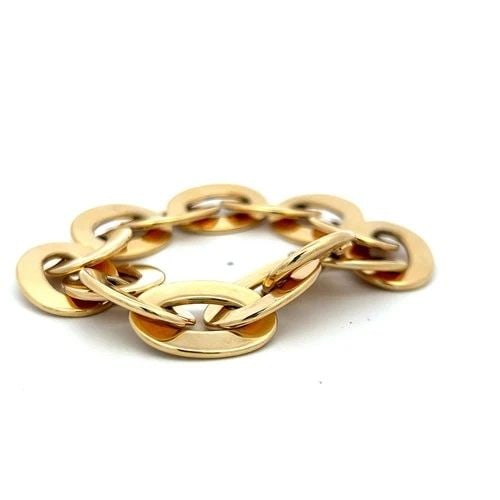 VINTAGE 18K YELLOW GOLD CHAIN LINK BRACELET 28 GRAMS 8*0.68*0.62IN: VINTAGE 18K YELLOW GOLD CHAIN LINK BRACELET 28 GRAMS 8*0.68*0.62IN Detailed Description: Elevate your street style with this vintage 18K yellow gold bracelet, embodying a robust urban charm. The chunk