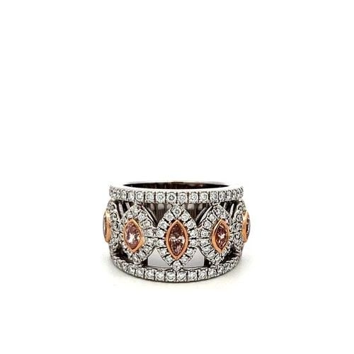 1.95CT DIAMOND BAND RING 18K TWO-TONE GOLD PINK MARQUISE & E VS VINTAGE: 1.95CT DIAMOND BAND RING 18K TWO-TONE GOLD PINK MARQUISE & E VS VINTAGE Title: This stunning vintage 18K two-tone gold band ring showcases a luxurious combination of faint pink marquise diamonds and b