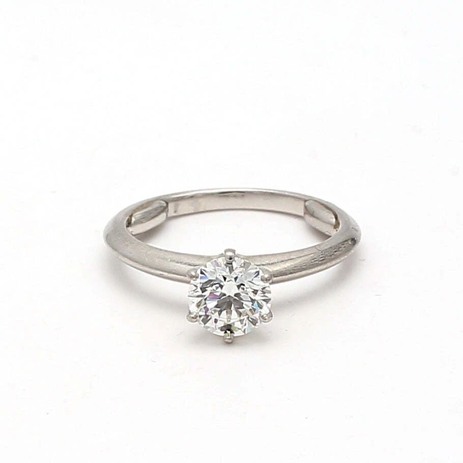 TIFFANY & CO.. 0.83 CARAT ROUND BRILLIANT I-VS1 DIAMOND PLATINUM RING: TIFFANY & CO.. 0.83 CARAT ROUND BRILLIANT I-VS1 DIAMOND PLATINUM RING Tiffany & Co. Tiffany & Co.. 0.83 Carat Round Brilliant I-VS1 Diamond Platinum Ring Details Department Unisex Adults Main Stone Di