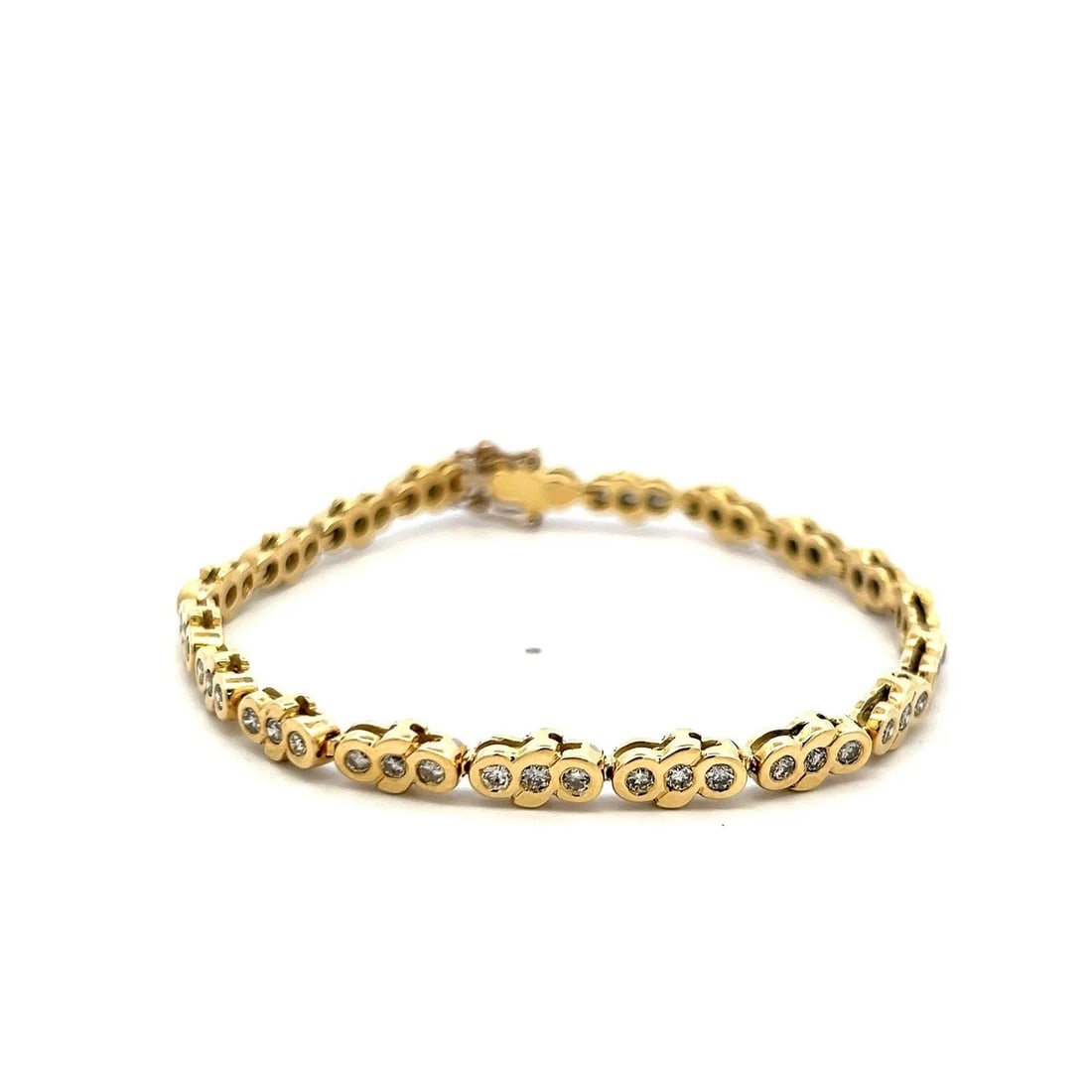 1.11CT ROUND DIAMOND TENNIS BRACELET IN 14K YELLOW GOLD VINTAGE ESTATE: 1.11CT ROUND DIAMOND TENNIS BRACELET IN 14K YELLOW GOLD VINTAGE ESTATE Title: This vintage 14K yellow gold tennis bracelet features 1.11 carats of round brilliant diamonds set in a charming triple-bez