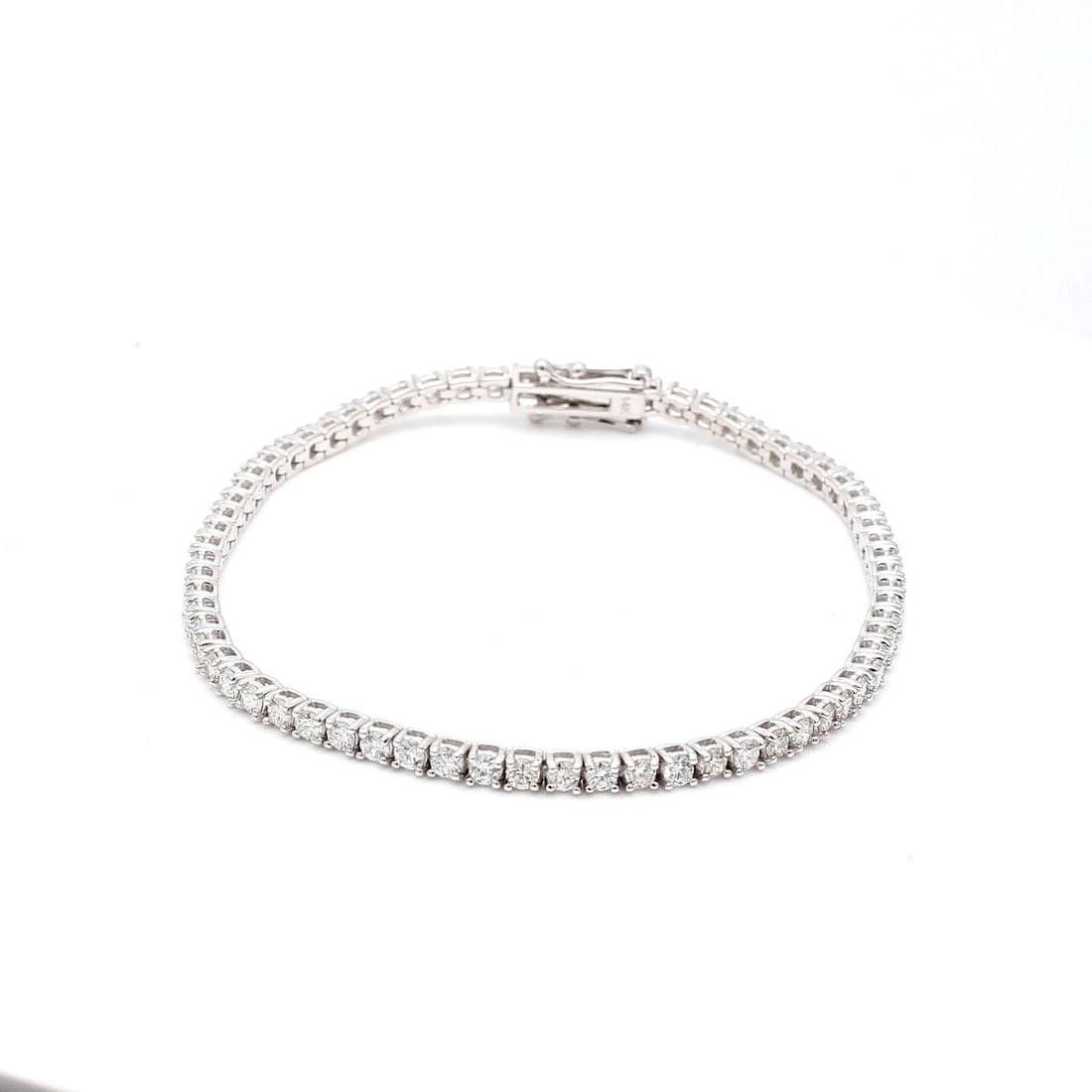 3.09 CARAT ROUND BRILLIANT F VS2 DIAMOND 14K WG TENNIS BRACELET: 3.09 CARAT ROUND BRILLIANT F VS2 DIAMOND 14K WG TENNIS BRACELET 3.09 Carat Round Brilliant F VS2 Diamond 14 Karat White Gold Tennis Bracelet 14k Details Department Unisex Adults Main Stone Diamond Met