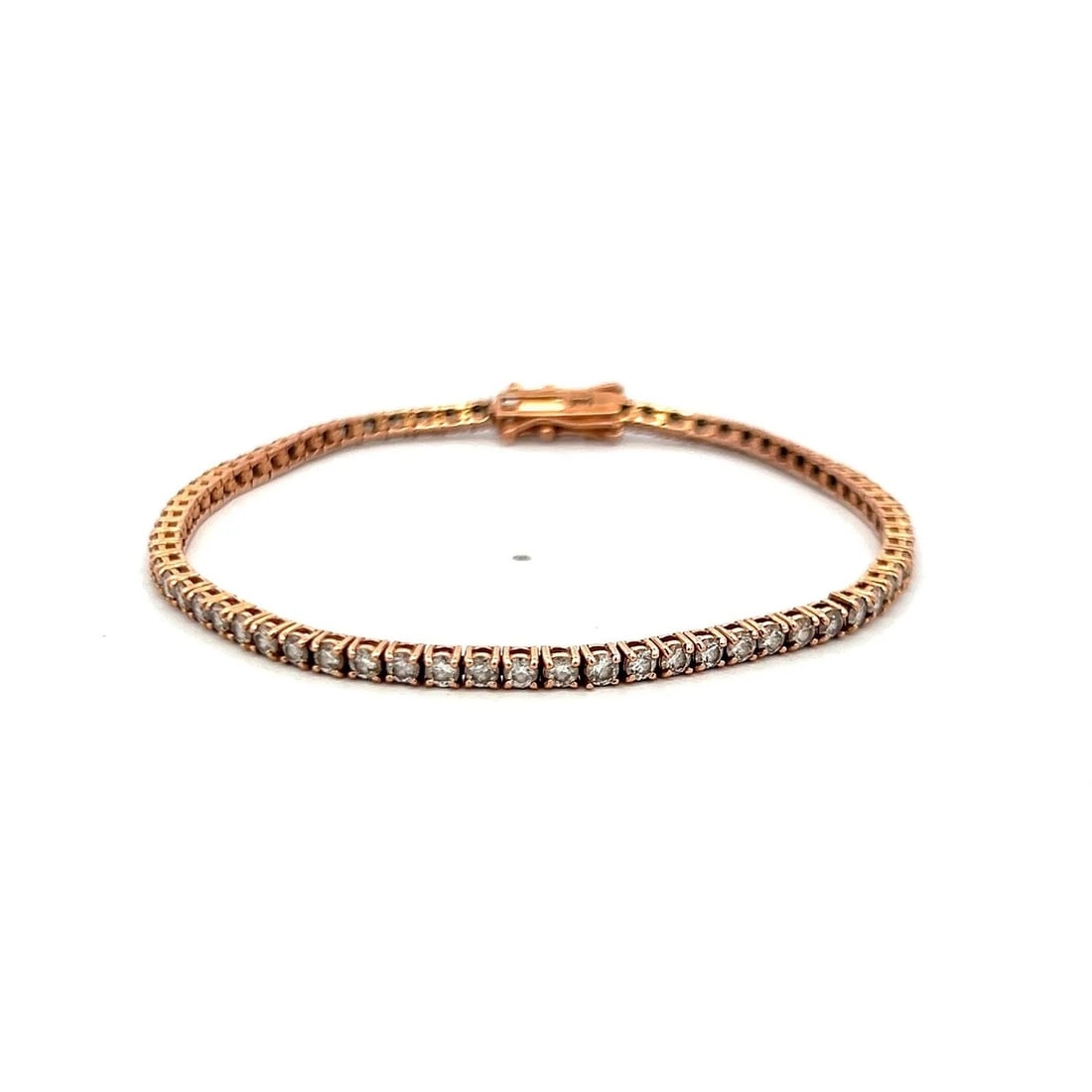3.10 CARAT ROUND BRILLIANT G VS DIAMOND 14 KARAT ROSE GOLD TENNIS BRACELET: 3.10 CARAT ROUND BRILLIANT G VS DIAMOND 14 KARAT ROSE GOLD TENNIS BRACELET PRODUCT DESCRIPTION Title: 3.10 Carat Round Brilliant G VS Diamond 14 Karat Rose Gold Tennis Bracelet Style: Tennis Metal: 14
