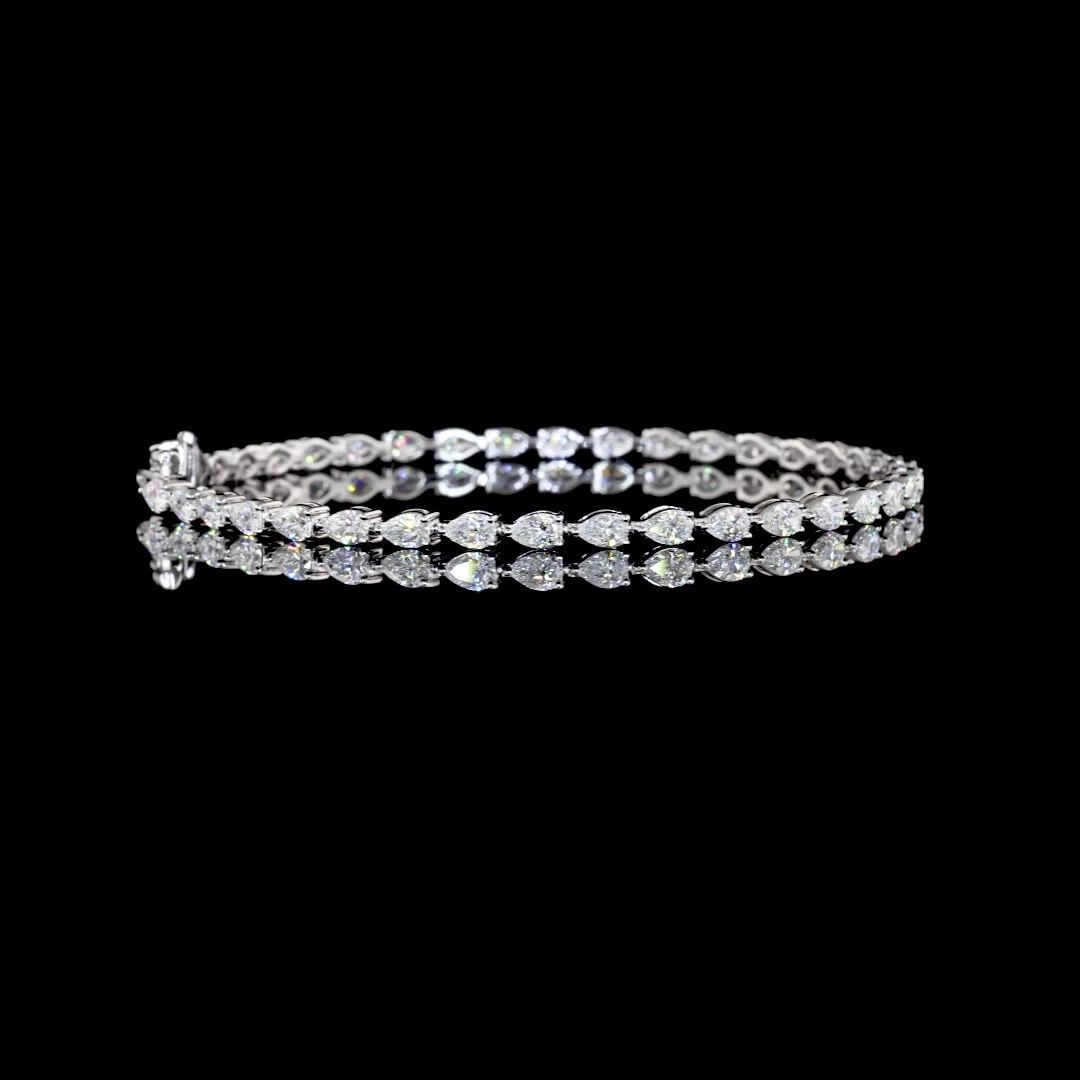 LAB-GROWN 4.00 CARAT PEAR E-VS DIAMOND 14K WHITE GOLD TENNIS BRACELET: LAB-GROWN 4.00 CARAT PEAR E-VS DIAMOND 14K WHITE GOLD TENNIS BRACELET Title: High-quality Brand-New Echo Friendly Elegant Lab-Grown 4.00 Carat Pear E-VS Diamond 14K White Gold Tennis Bracelet Video Li