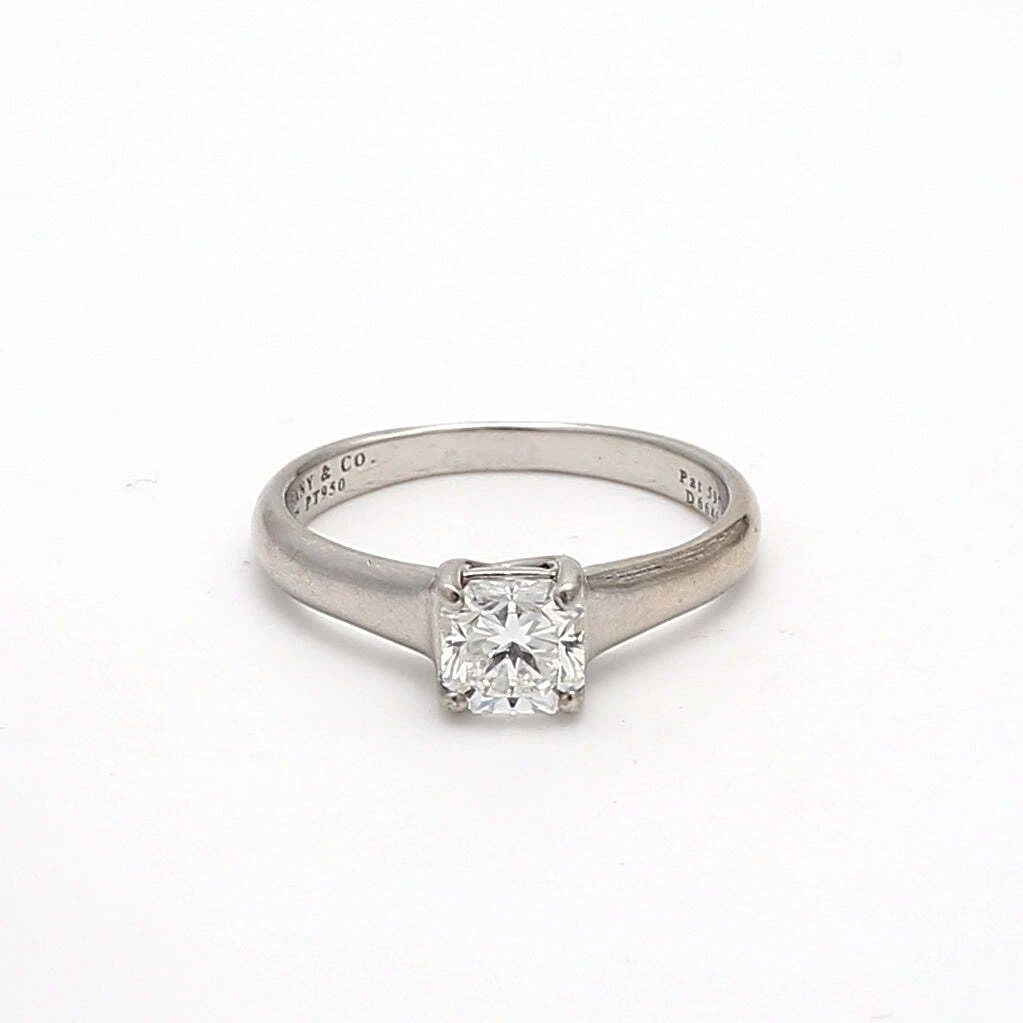 TIFFANY & CO. 0.73 CARAT EMERALD CUT F VVS1 DIAMOND WHITE PLATINUM RING: TIFFANY & CO. 0.73 CARAT EMERALD CUT F VVS1 DIAMOND WHITE PLATINUM RING Title: Tiffany & Co 0.73 Carat Emerald Cut F VVS1 Diamond White Platinum Engagement Ring Style: Engagement Metal: White Platinum