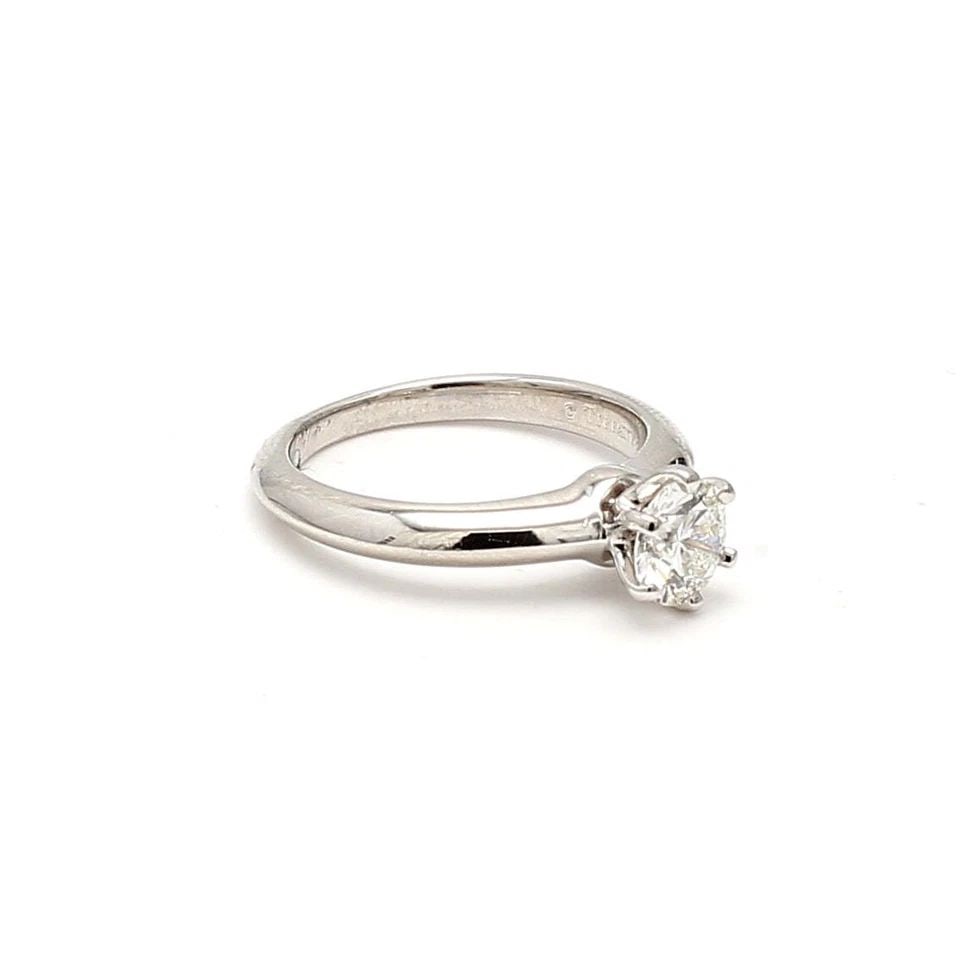 TIFFANY & CO. 0.65 CARAT ROUND BRILLIANT H VVS2 DIAMOND PLATINUM ENGAGEMENT RING: TIFFANY & CO. 0.65 CARAT ROUND BRILLIANT H VVS2 DIAMOND PLATINUM ENGAGEMENT RING Tiffany & Co. Tiffany & Co. 0.65 Carat Round Brilliant H VVS2 Diamond Platinum Engagement Ring Details Department Unise