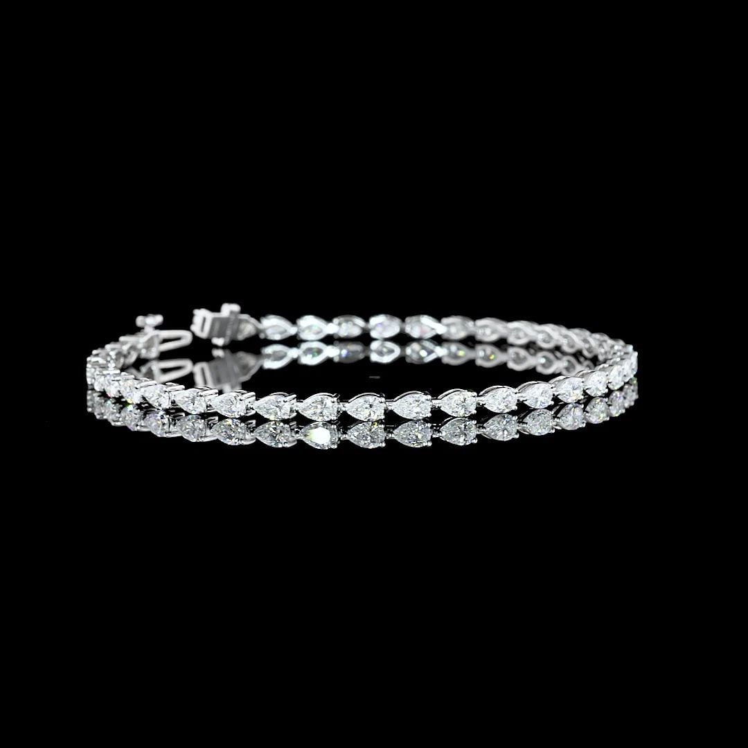 LAB-GROWN 4.18 CARAT PEAR E-VS DIAMOND 14K WHITE GOLD TENNIS BRACELET: LAB-GROWN 4.18 CARAT PEAR E-VS DIAMOND 14K WHITE GOLD TENNIS BRACELET Lab-Grown 4.18 Carat Pear E-VS Diamond 14K White Gold Tennis Bracelet 18k Details Department Unisex Adults Main Stone No Stone Met