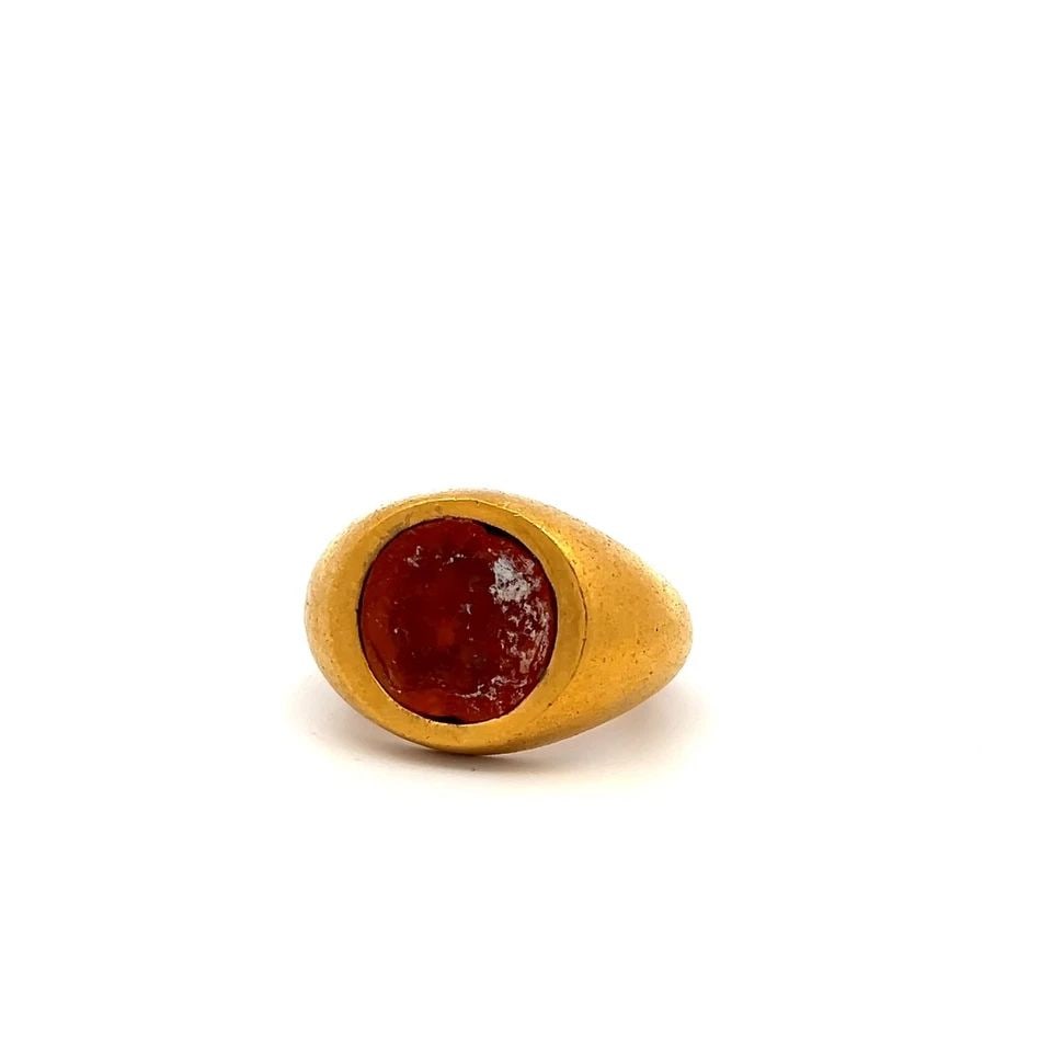VINTAGE 23K YG COCKTAIL RING WITH 13.4X12.9 MM INTAGLIO CARNELIAN SIZE 5.5: VINTAGE 23K YG COCKTAIL RING WITH 13.4X12.9 MM INTAGLIO CARNELIAN SIZE 5.5 Detailed Description: Embrace timeless elegance with this luxurious vintage cocktail ring crafted in 23 karat yellow gold. Th