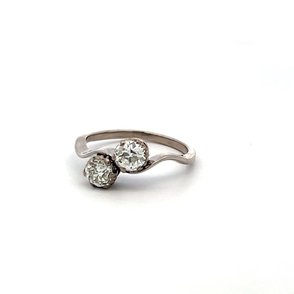 PLATINUM TWO-STONE RING WITH 1.13 CARAT CIRCULAR BRILLIANT I-SI2 DIAMONDS: PLATINUM TWO-STONE RING WITH 1.13 CARAT CIRCULAR BRILLIANT I-SI2 DIAMONDS Detailed Description: Embrace timeless elegance with this stunning platinum two-stone ring. Featuring two circular brilliant-c