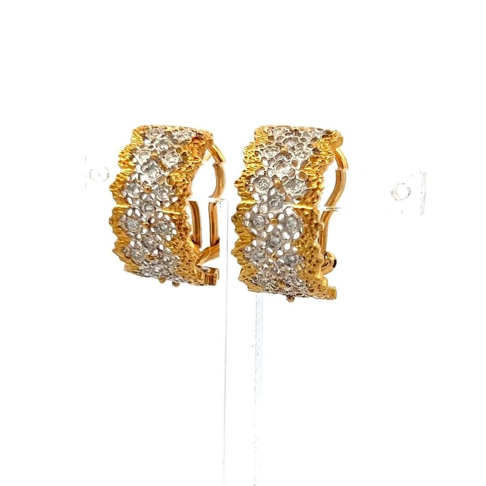 VINTAGE 18K YG HOOP EARRINGS WITH 0.6 CARAT ROUND BRILLIANT G-VS DIAMONDS: VINTAGE 18K YG HOOP EARRINGS WITH 0.6 CARAT ROUND BRILLIANT G-VS DIAMONDS Video: Video Link Detailed Description: These stunning vintage hoop earrings, crafted from 18K yellow gold, boast a luxurious 
