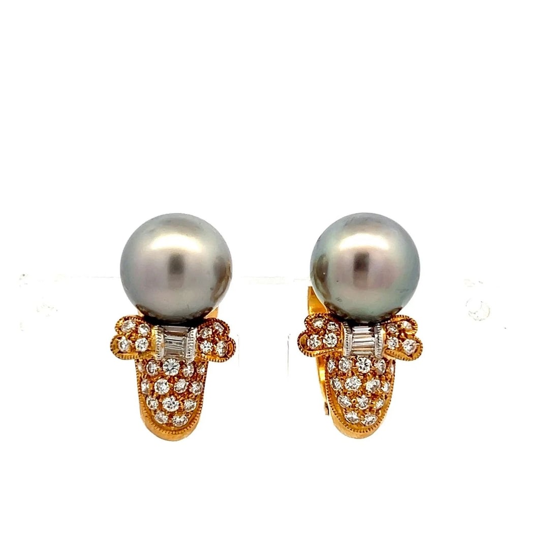 18K YG CLIP-ON EARRINGS WITH 0.62 CARAT H-VS DIAMONDS & 10 MM TAHITIAN PEARLS: 18K YG CLIP-ON EARRINGS WITH 0.62 CARAT H-VS DIAMONDS & 10 MM TAHITIAN PEARLS Detailed Description: Elevate your style with these vintage 18K yellow gold clip-on earrings. Featuring stunning 10.00 mm 