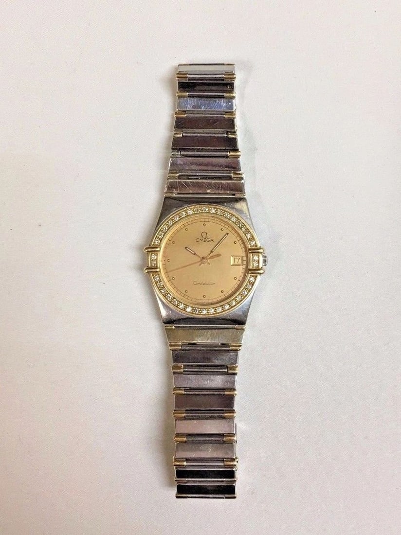 WOMEN'S OMEGA CONSTELLATION 1448 DIAMOND BEZEL WITH 18K GOLD/SS: WOMEN'S OMEGA CONSTELLATION 1448 DIAMOND BEZEL WITH 18K GOLD/SS Women's Omega 1448 Diamond Bezel with 18k gold/ss You are bidding on a pre-owned Women's Omega 1448 watch. The watch is in excellent wor