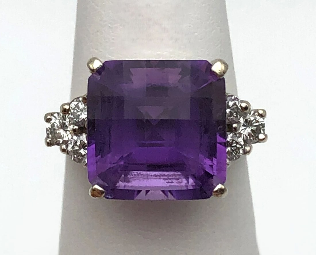 14K WHITE GOLD RING SET WITH 7CT AMETHYST AND 0.50CTS OF DIAMONDS SIZE: 6.75: 14K WHITE GOLD RING SET WITH 7CT AMETHYST AND 0.50CTS OF DIAMONDS SIZE: 6.75 14k White Gold Ring set with Amethyst and 0.50cts of Diamonds Condition: Used, has been worn and moved around in inventory 