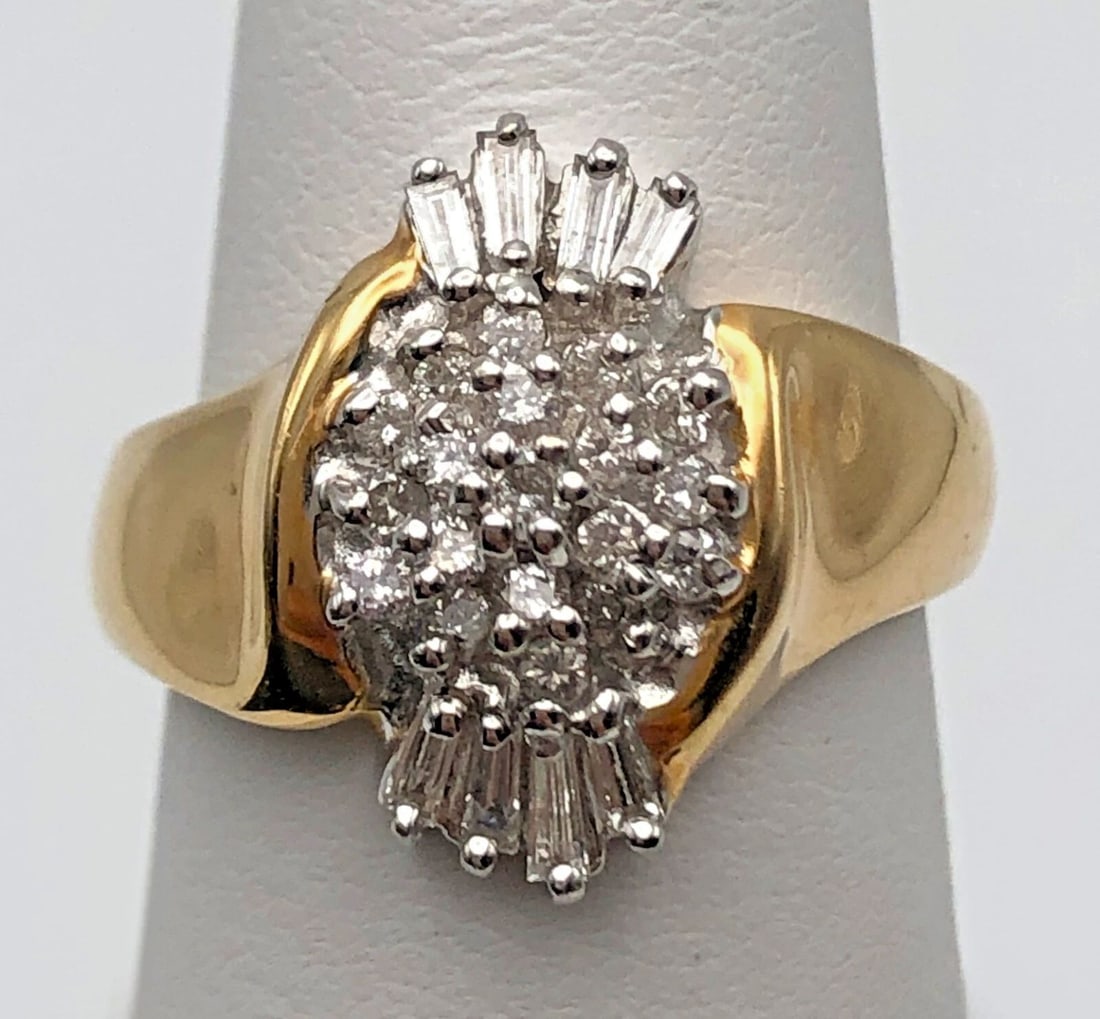 14K GOLD WOMAN'S CLUSTER STYLE RING WITH 0.53CTS OF DIAMONDS SIZE: 6.75 6.7G: 14K GOLD WOMAN'S CLUSTER STYLE RING SET WITH 0.53CTS OF DIAMONDS SIZE: 6.75 14k Gold Woman's cluster style Ring set with 0.53cts of Diamonds Condition: Used, has been cleaned Material: 14k Yellow Gold