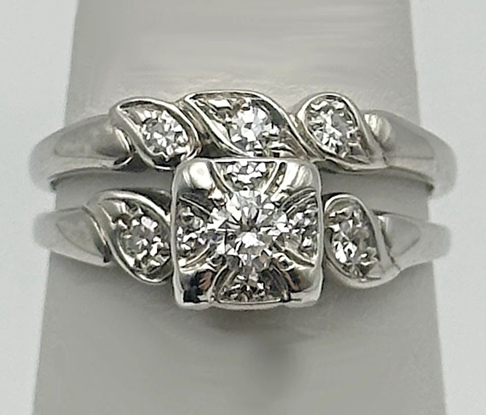 14K WHITE GOLD RINGS ENGAGEMENT SET WITH 0.33CTW DIAMONDS ( SIZE 5.75 ) 3.4 GRAM: 14k White Gold Rings Engagement Set with 0.33cts of Diamonds You are bidding on a 14k White Gold Diamond Ring Set. The rings have been fully restored by our in house jewelers, there maybe a few minor 