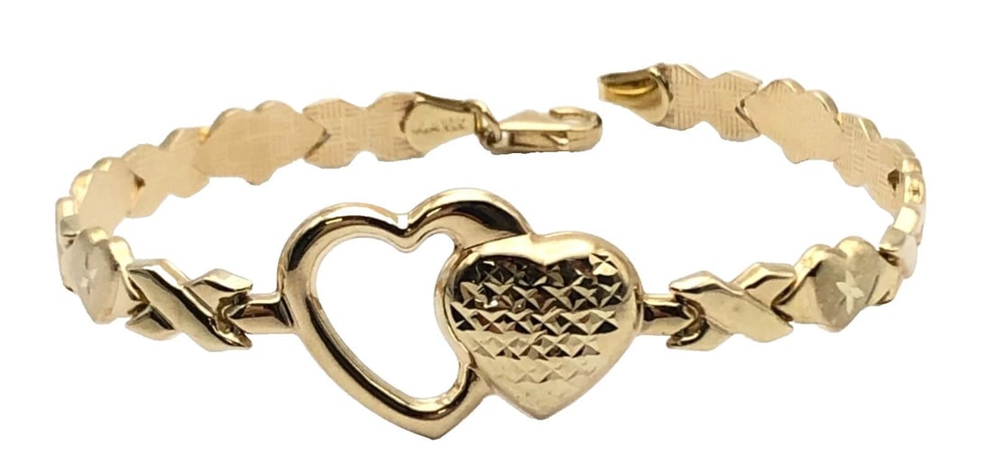 10K GOLD HEART LINKED BRACELET WITH DOUBLE HEART PIECE ( 7.5 INCH ) 5.7G: 10K GOLD HEART LINKED BRACELET WITH CENTER DOUBLE HEART PIECE 7.5" 5.7 GRAMS 10k Gold Heart Linked Bracelet with center double Heart piece Condition: Display Piece, Light wear Material: 10k Yellow Gol
