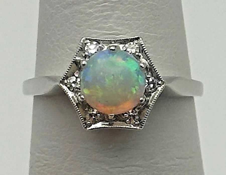 14K WHITE GOLD RING WITH NATURAL OPAL AND DIAMONDS (SIZE 6) 2.8 GRAMS: 14K WHITE GOLD RING WITH DIAMONDS AND OPAL SIZE: 6 14k White Gold Ring with Diamonds and Opal Size: 6 You are bidding on a 14k White Gold Ring with Diamonds and Opal. There are a few minor scratches o