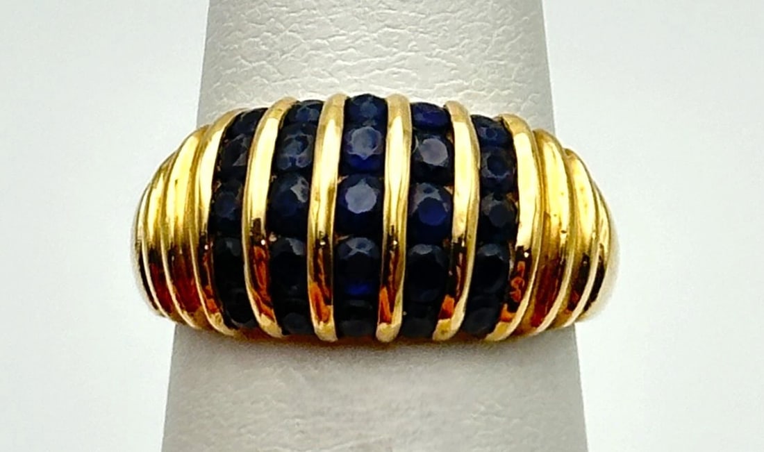 10K GOLD RING WITH 1.00CTW NATURAL SAPPHIRES (SIZE 4.75) 3.1 GRAM: 10K GOLD RING SET WITH 1.00CTW OF NATURAL SAPPHIRES SIZE: 4.75 10k Gold Ring set with 1.00ct of Natural Sapphires Condition: Used Material: 10k Yellow Gold Ring Size: 4.75 Weight: 3.1 grams Top Width: