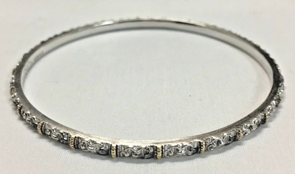 GABRIEL & CO STERLING SILVER BANGLE WITH 18K GOLD ACCENTS 35916-5 ( 16.4G ): GABRIEL & CO STERLING SILVER BANGLE WITH 18K GOLD 35916-5 Gabriel & Co sterling silver bangle with 18k gold 35916-5 You are bidding on a new with defects Gabriel & Co sterling silver bangle with 18k g