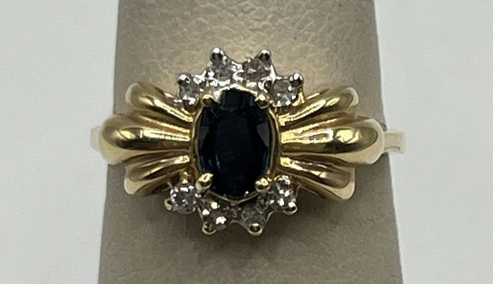 14KT YELLOW GOLD, DIAMOND & SAPPHIRE RING SIZE 6.25: 14KT YELLOW GOLD, DIAMOND & SAPPHIRE RING SIZE 6.25 14KT YELLOW GOLD, DIAMOND & SAPPHIRE RING SIZE 6.25 This stunning ring is made of 14k yellow gold and features a beautiful combination of sapphire a