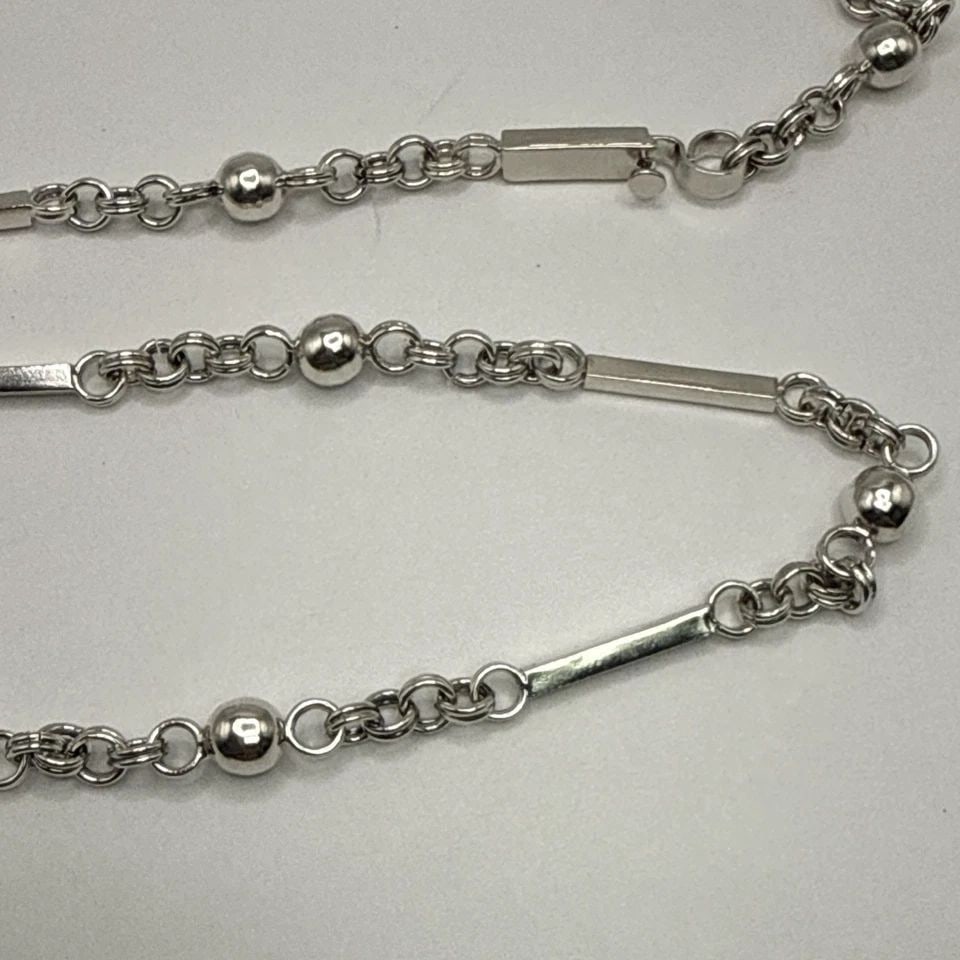 28" STERLING SILVER BALL AND BAR WITH CIRCLE LINK NECKLACE 53 GRAMS: 28" STERLING SILVER BALL AND BAR WITH CIRCLE LINK NECKLACE 53 GRAMS The 28" Sterling Silver Ball and Bar with Circle Link Necklace is a stunning piece of fine jewelry crafted from 925 sterling silver.