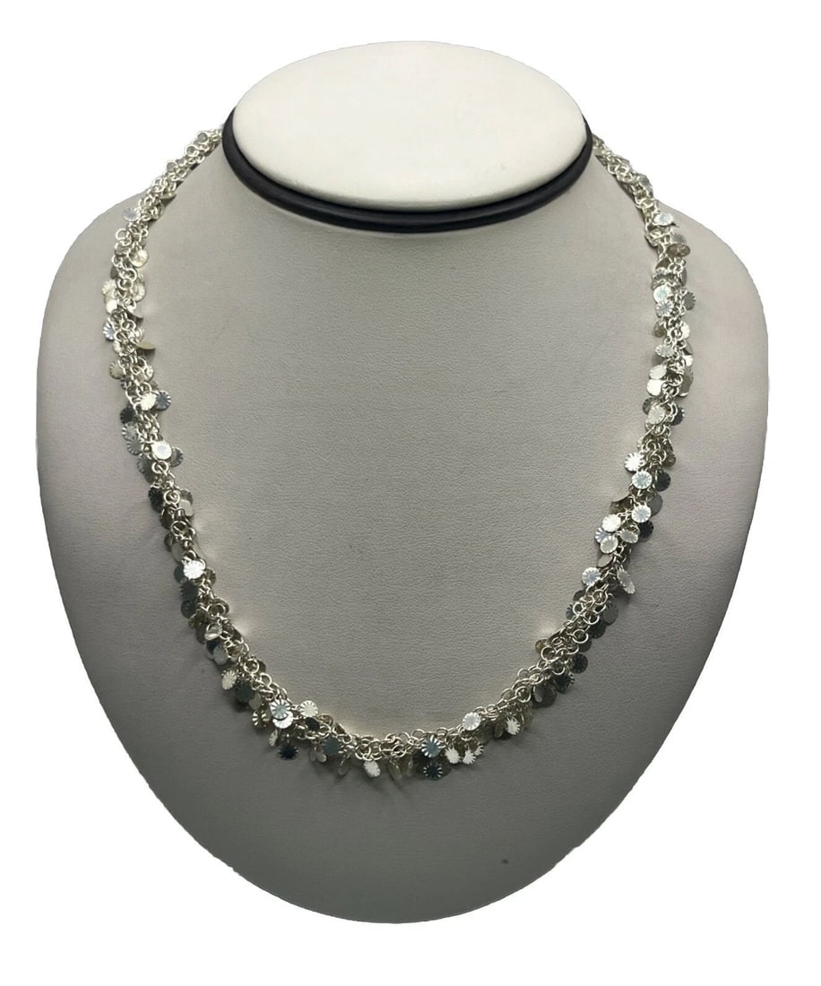 STERLING SILVER 18" CONFETTI NECKLACE 21.1 GRAMS: STERLING SILVER 18" CONFETTI NECKLACE 21.1 GRAMS STERLING SILVER 18" CONFETTI NECKLACE 21.1 GRAMS This Sterling Silver 18" Confetti Necklace is made in Italy with a metal purity of 925. The necklace f