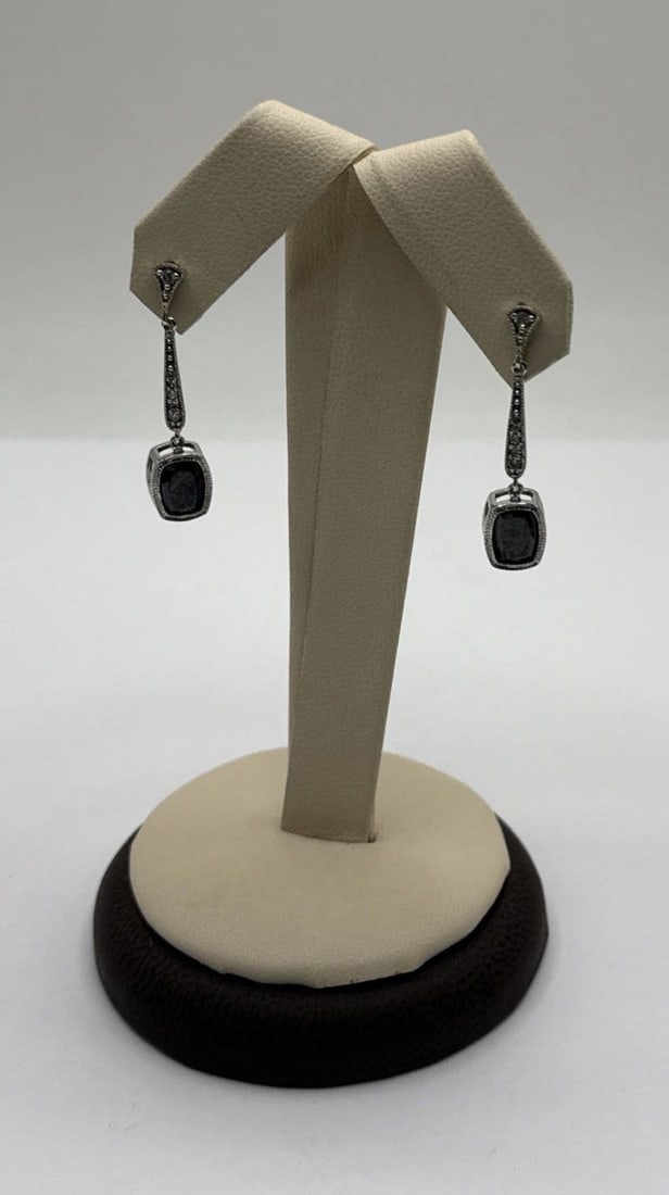 STERLING SILVER DROP EARRINGS WITH BLACK AND COLORLESS STONES: STERLING SILVER DROP EARRINGS WITH BLACK AND COLORLESS STONES STERLING SILVER DROP EARRINGS WITH BLACK AND COLORLESS STONES Elevate your accessory game with these elegant Sterling Silver Drop Earrings