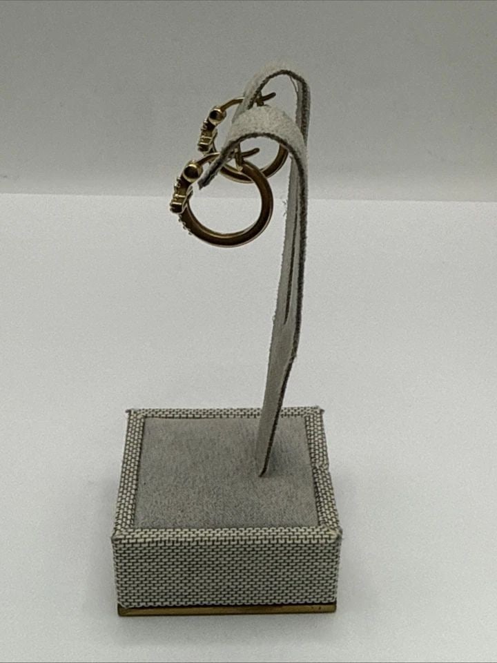 GOLD COLOR STERLING SILVER WITH COLORLESS STONES CROSS HOOPS: Gold Color Sterling Silver with Colorless Stones Cross Hoops These Gold Color Sterling Silver Cross Hoops are a beautiful and elegant pair of earrings featuring colorless stones. The hoop style adds a
