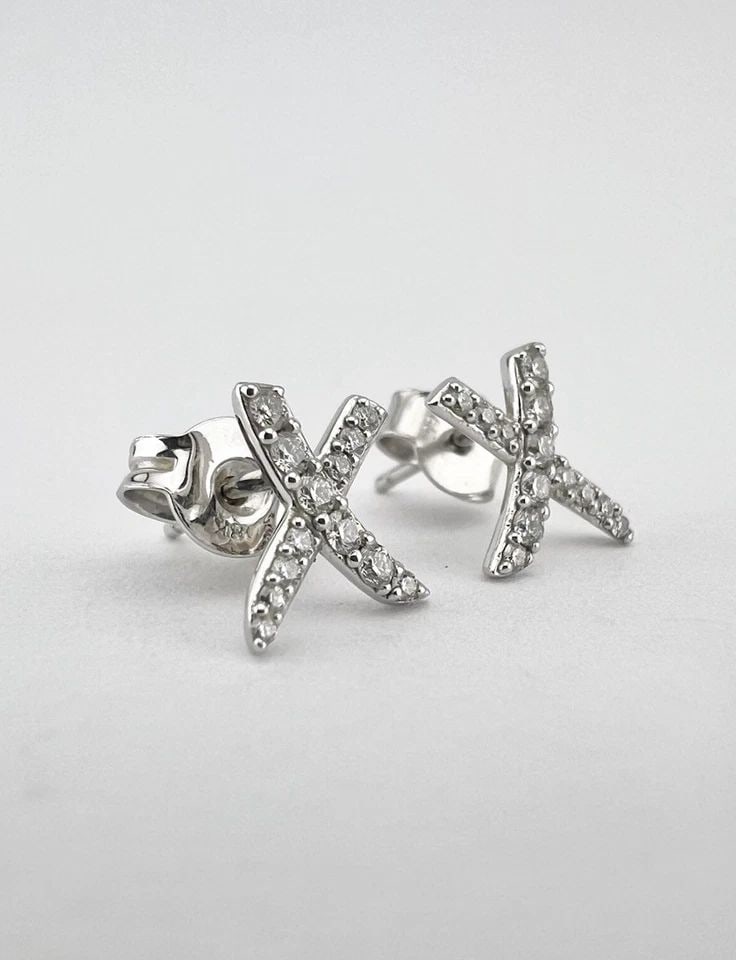 TIFFANY & CO. PALOMA PICASSO 18K WHITE GOLD PAVE DIAMONDS X KISS POST EARRINGS: TIFFANY & CO. PALOMA PICASSO 18K WHITE GOLD PAVE DIAMONDS X KISS POST EARRINGS Tiffany & Co. Paloma Picasso 18K White Gold Pave Diamonds X Kiss Post Earrings Size: 3/8" (8mm) Tall By Over 1/4" (7mm) W