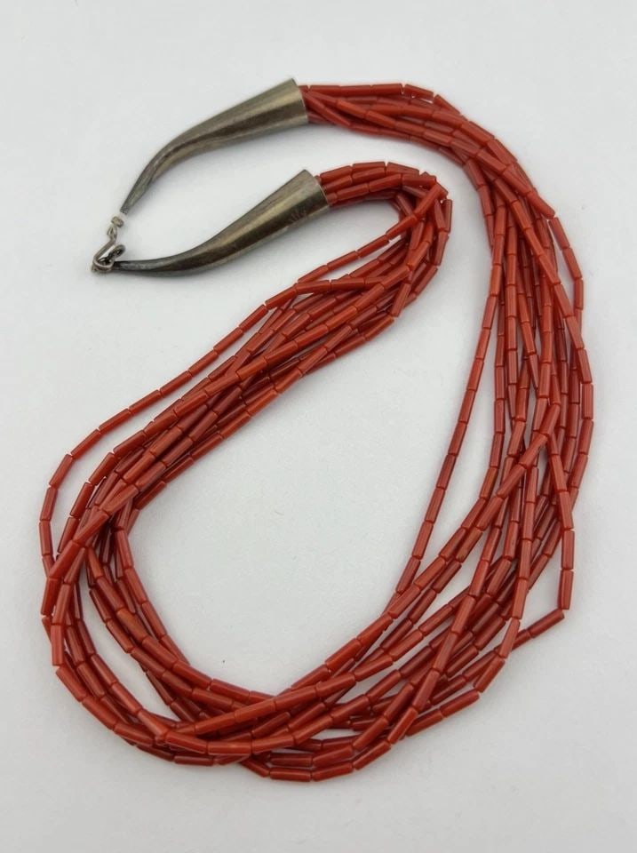 NAVAJO STERLING MULTI-STRAND NATURAL OX BLOOD CORAL HEISHI TUBE BEAD NECKLACE: NAVAJO STERLING MULTI-STRAND NATURAL OX BLOOD CORAL HEISHI TUBE BEAD NECKLACE Vtg Navajo Sterling Silver Multi-Strand Natural Ox Blood Coral Heishi Tube Bead Necklace Size: 20" Long Tip Ti Tip Metal: 