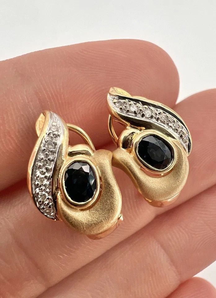 DESIGNER 14K YELLOW GOLD BLUE SAPPHIRE & DIAMOND OMEGA BACK POST EARRINGS: DESIGNER 14K YELLOW GOLD BLUE SAPPHIRE & DIAMOND OMEGA BACK POST EARRINGS Designer 14K Yellow Gold Blue Sapphire & Diamond Omega Back Post Earrings Size: 3/4" Tall By Just Under 1/2" Wide Metal: 14k Y
