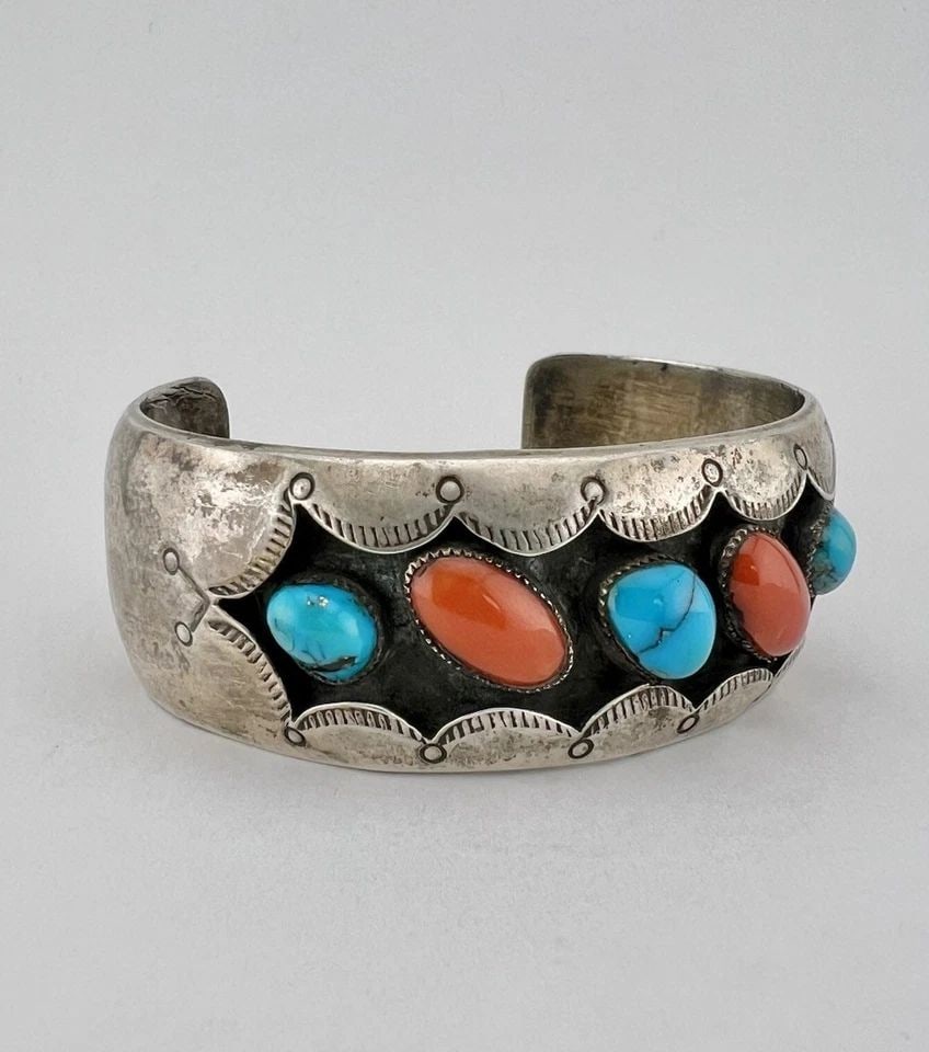 VINTAGE NAVAJO STERLING SILVER CORAL & TURQUOISE SHADOWBOX STAMPED CUFF BRACELET: VINTAGE NAVAJO STERLING SILVER CORAL & TURQUOISE SHADOWBOX STAMPED CUFF BRACELET Vintage Navajo Sterling Silver Coral & Turquoise Shadowbox Stamped Cuff Bracelet Cuff is 5 1/4" tip to Tip and has a 1 