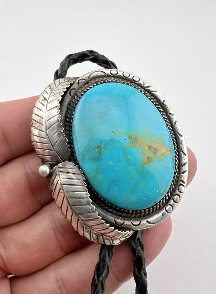 VTG NAVAJO STERLING SILVER BLUE GEM TURQUOISE STAMPED FEATHER OVAL BOLO TIE 2": VTG NAVAJO STERLING SILVER BLUE GEM TURQUOISE STAMPED FEATHER OVAL BOLO TIE 2" Vtg Navajo Sterling Silver Blue Gem Turquoise Stamped Feather Oval Bolo Tie 2" Size: 2" Tall by Over 1 3/4" Wide Weight i
