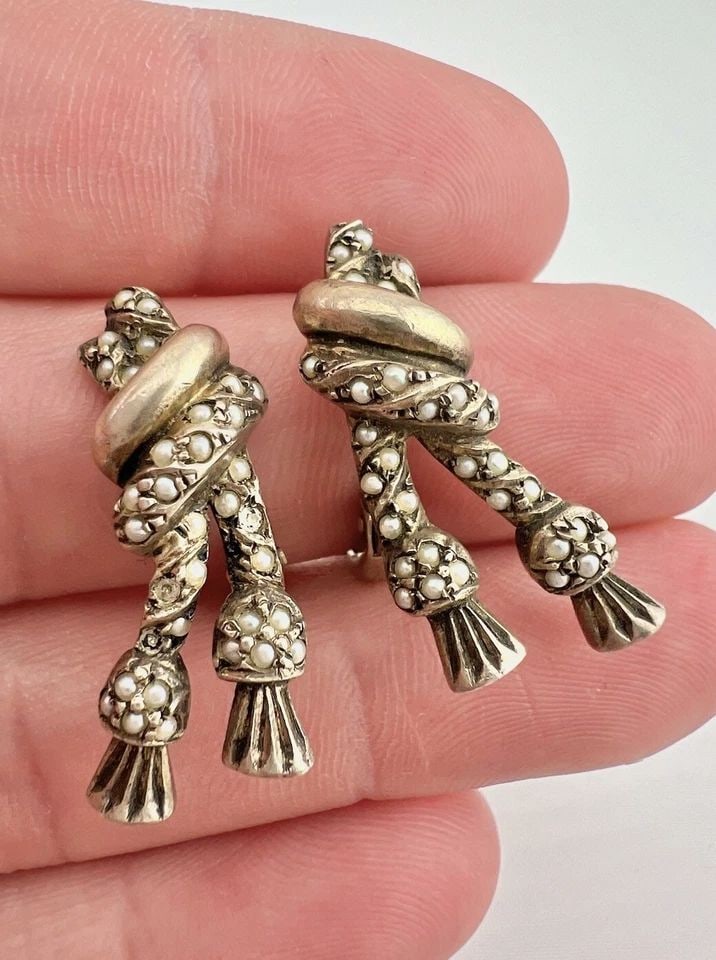 ANTIQUE VICTORIAN GERMANY GILT SILVER & SEED PEARL KNOTT TASSEL CLIP EARRINGS: ANTIQUE VICTORIAN GERMANY GILT SILVER & SEED PEARL KNOTT TASSEL CLIP EARRINGS Antique Victorian Germany Gilt Silver & Seed Pearl Knott Tassel Clip Earrings 1 1/8" Size: 1 1/8" Tall By 1/2" Wide At The