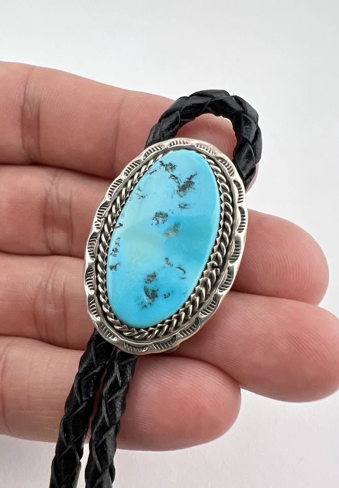 VINTAGE NAVAJO STERLING SILVER SLEEPING BEAUTY TURQUOISE STAMPED OVAL BOLO TIE (1 of 2)