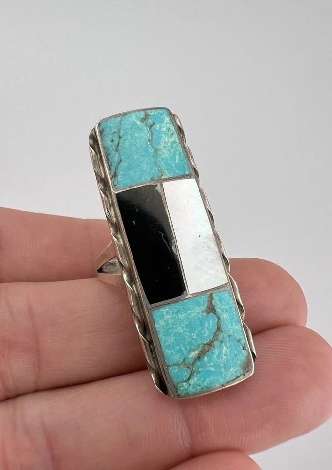 VTG N.LEE NAVAJO STERLING SILVER TURQUOISE & MOTHER OF PEARL & JET FLUSH RING: VTG N.LEE NAVAJO STERLING SILVER TURQUOISE & MOTHER OF PEARL & JET FLUSH RING Vtg N.Lee Navajo Sterling Silver Turquoise & Mother Of Pearl & Jet Flush Ring Ring Size: 7.5 - Can Be Re Sized Weight is 1