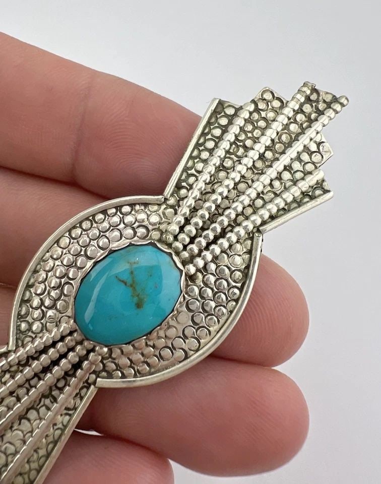 VINTAGE NAVAJO STERLING SILVER KINGMAN TURQUOISE STAMPED LONG PIN BROOCH 3 1/8": VINTAGE NAVAJO STERLING SILVER KINGMAN TURQUOISE STAMPED LONG PIN BROOCH 3 1/8" Vintage Navajo Sterling Silver Kingman Turquoise Stamped Long Pin Brooch 3 1/8" Size: 1" Tall by Over 3" Wide Metal: Ste